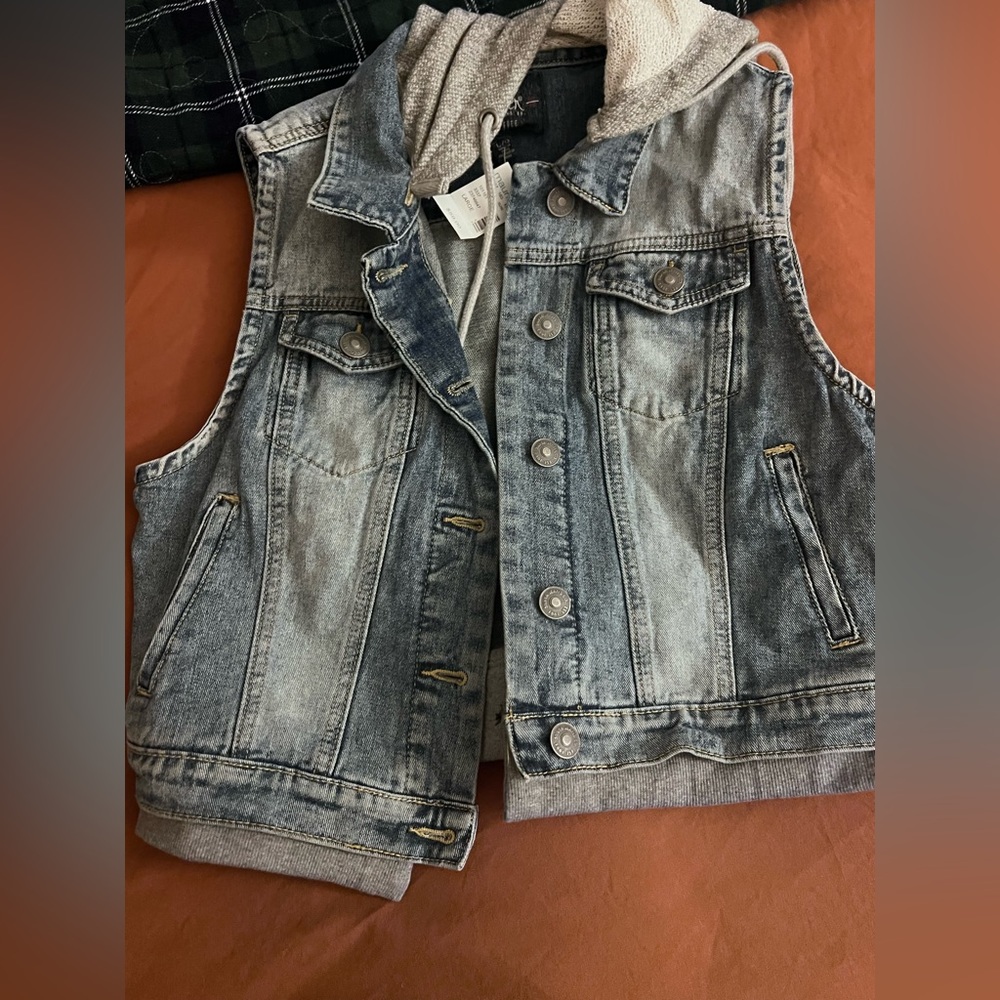 Never worn silver hooded vest